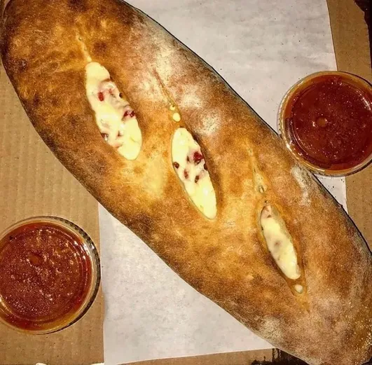 Build Your Own Hand Tossed Pizza, Stuffed Bread, Or Calzone image