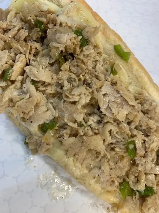 Chicken Philly Cheesesteak with peppers and onions and your choice of cheese (8oz of meat on a 10in Amoroso roll image