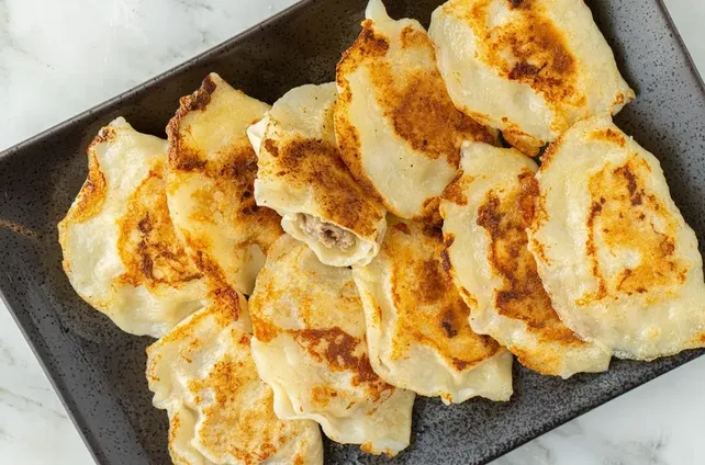 Pan Fried Chicken and Cabbage Dumplings (10pcs) image