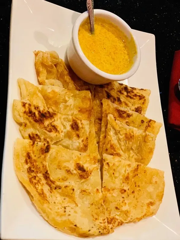 A.1 Roti With Curry Sauce image